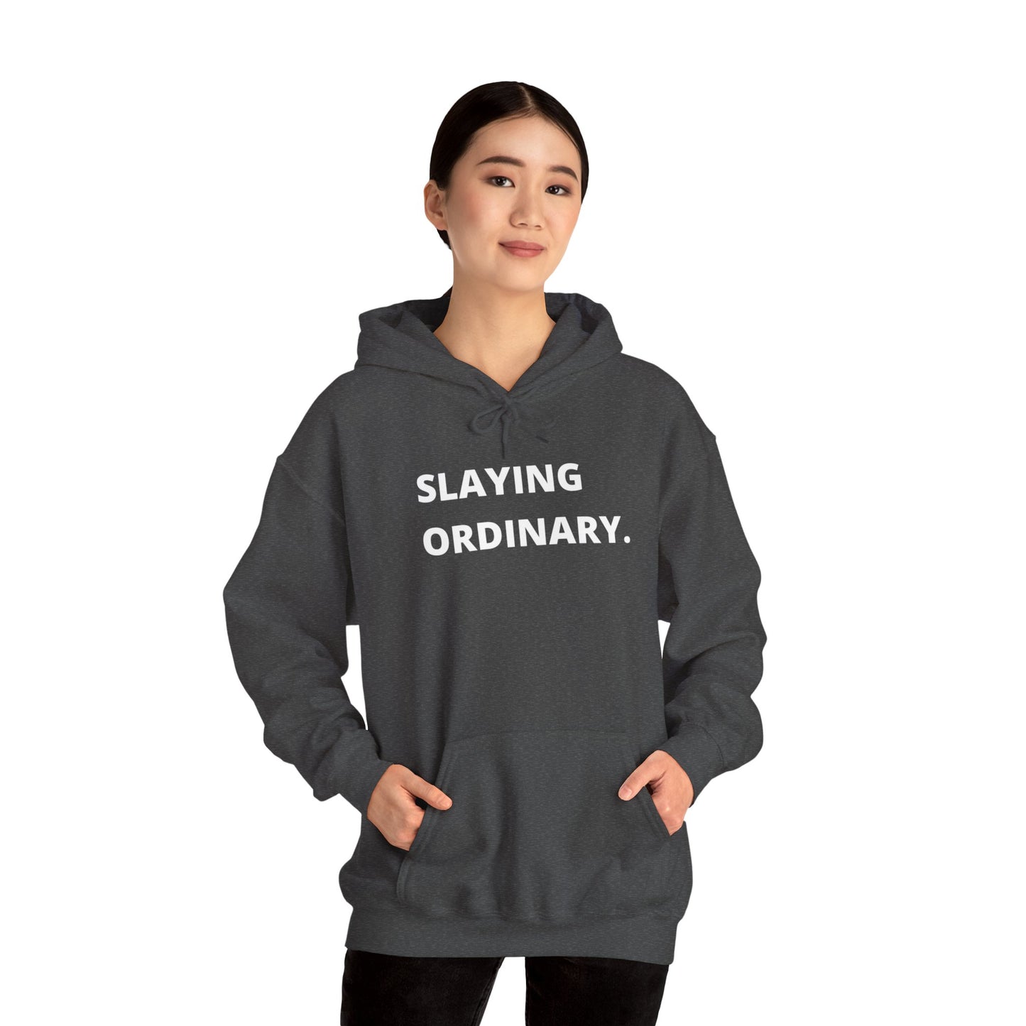 Slaying Ordinary Unisex Heavy Blend™ Hooded Sweatshirt